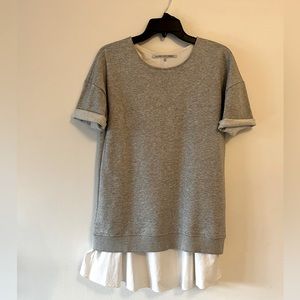 Sweatshirt dress with poplin detail. Back zipper detail